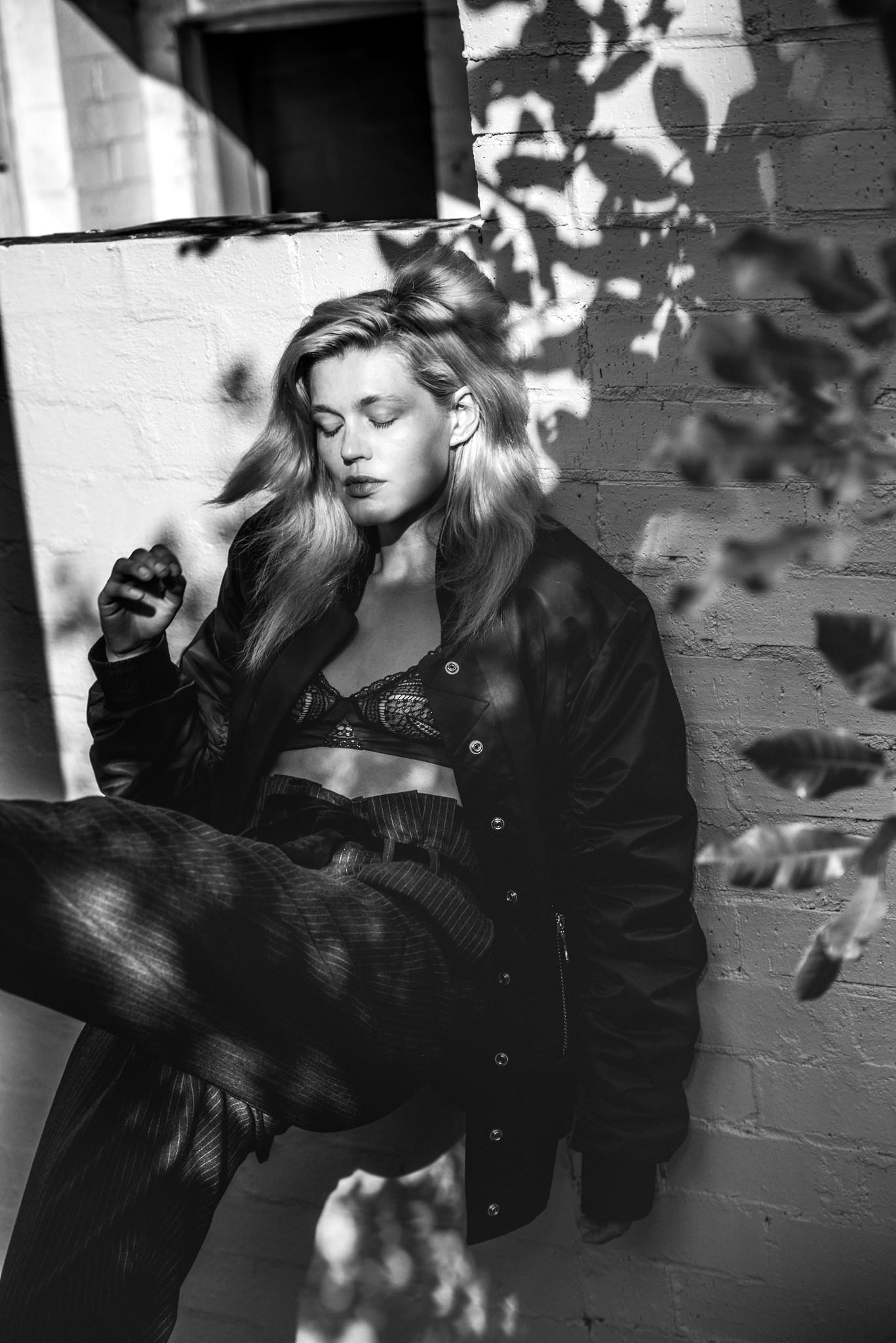 Alys Hale portrait leaning against wall