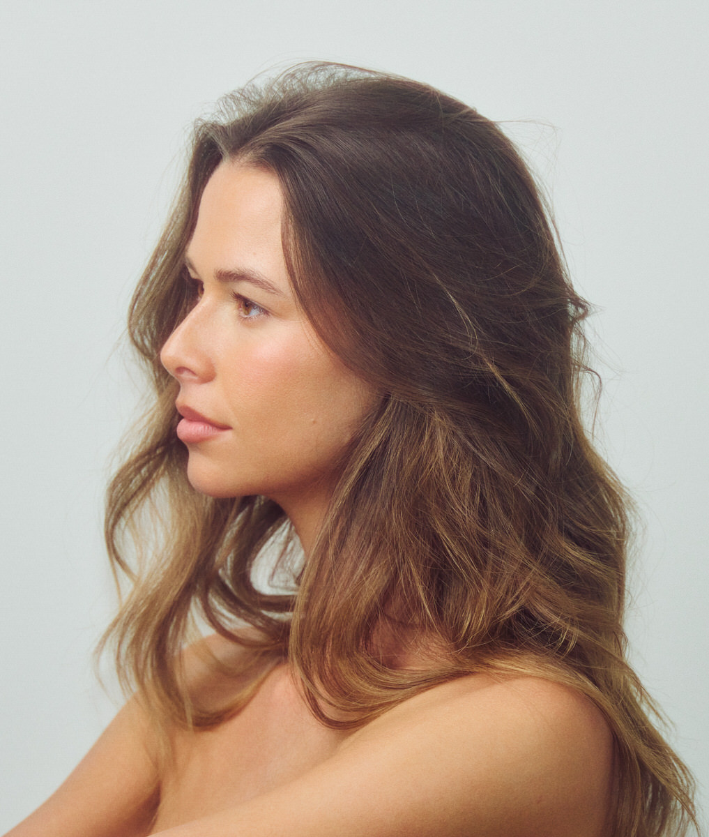 Soft colour profile portrait of Jess Holiday